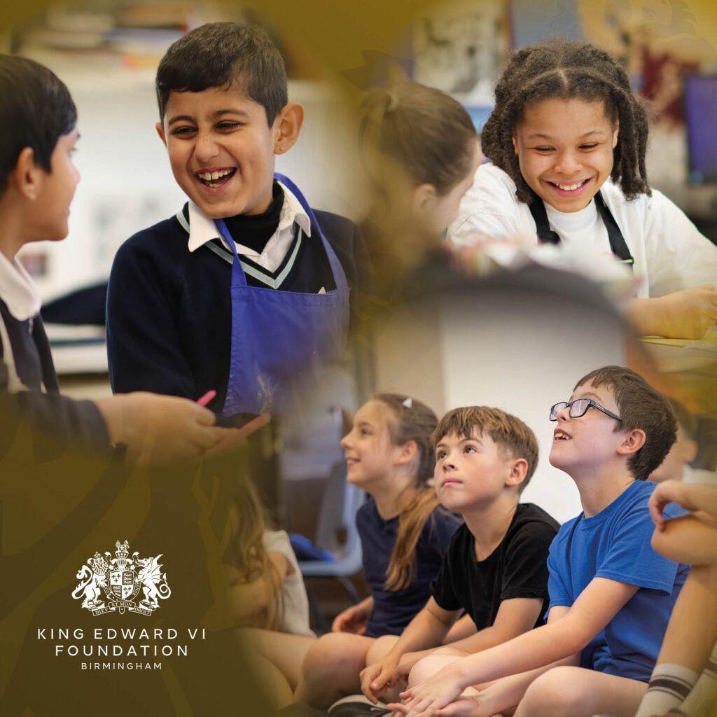 Students smiling and engaged in a classroom activity with a teacher