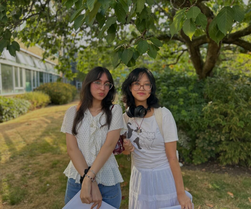 Two students enjoying their time outdoors on the Kevi Foundation campus.