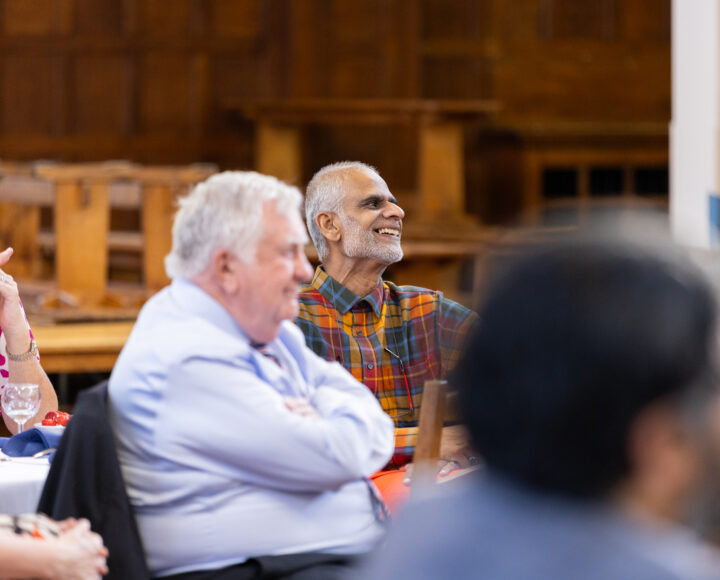 Fazle Kinkhabwala smiles amongst colleagues